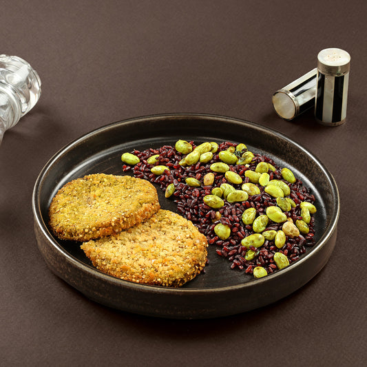Burger di quinoa e cavolo verde, riso venere edamame e noci 100 Grammi
